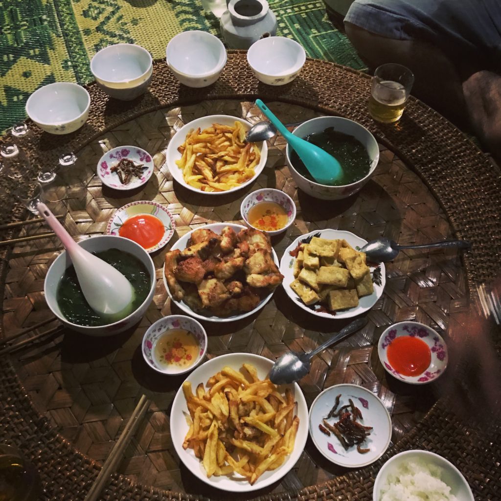A communal meal in Mai Chau, Vietnam.